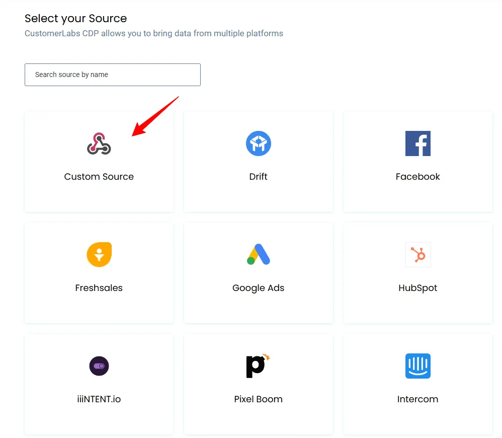 Select Custom Source – “CustomerLabs Sources page showing various integration options with Custom Source highlighted by a red arrow.”